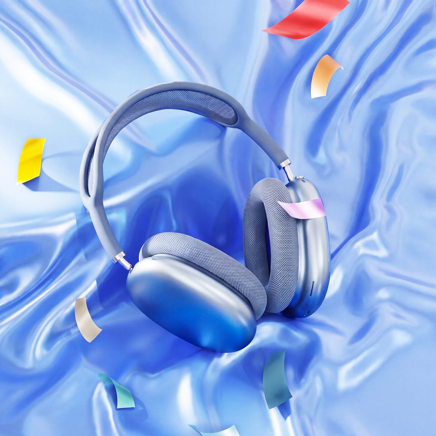 Headphones on blue silk with confetti